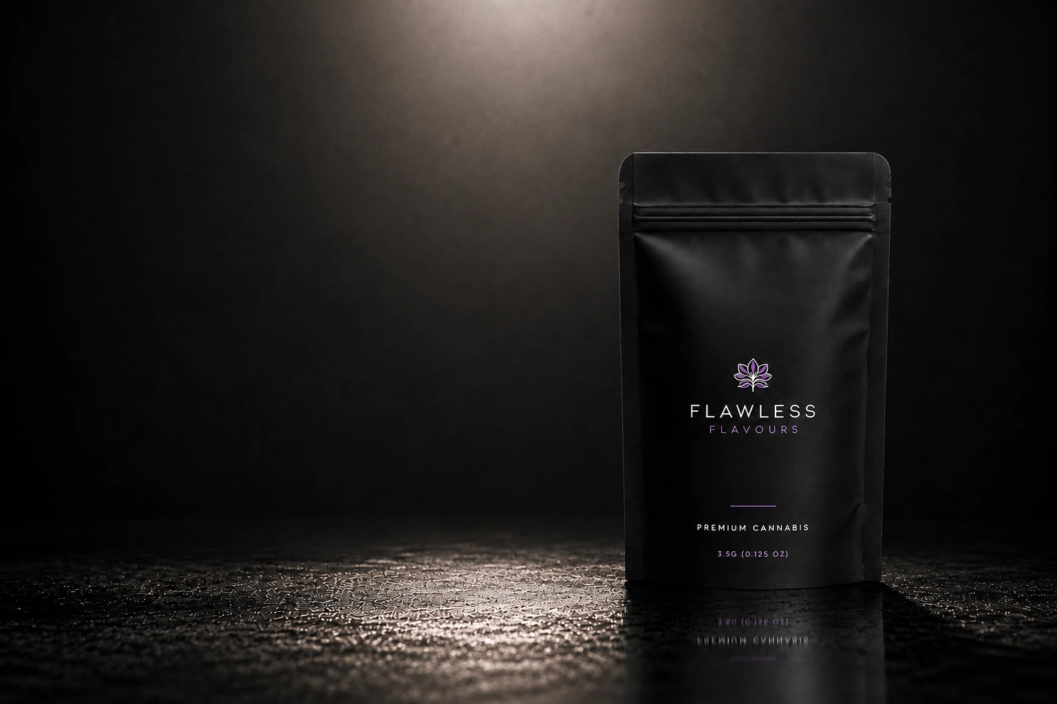 Flawless Flavours premium cannabis pouch, studio-lit on a dark reflective stage